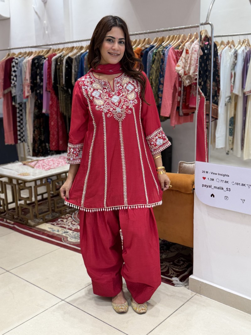 Rich Rani Pink / Magenta Pink, giving the outfit a bright and elegant festive look.